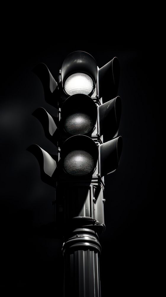 Photography of traffic light black architecture illuminated.