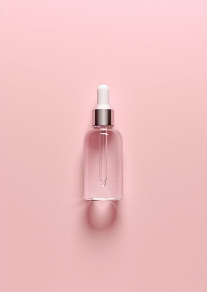 Serum dropper bottle  cosmetics perfume lighting.