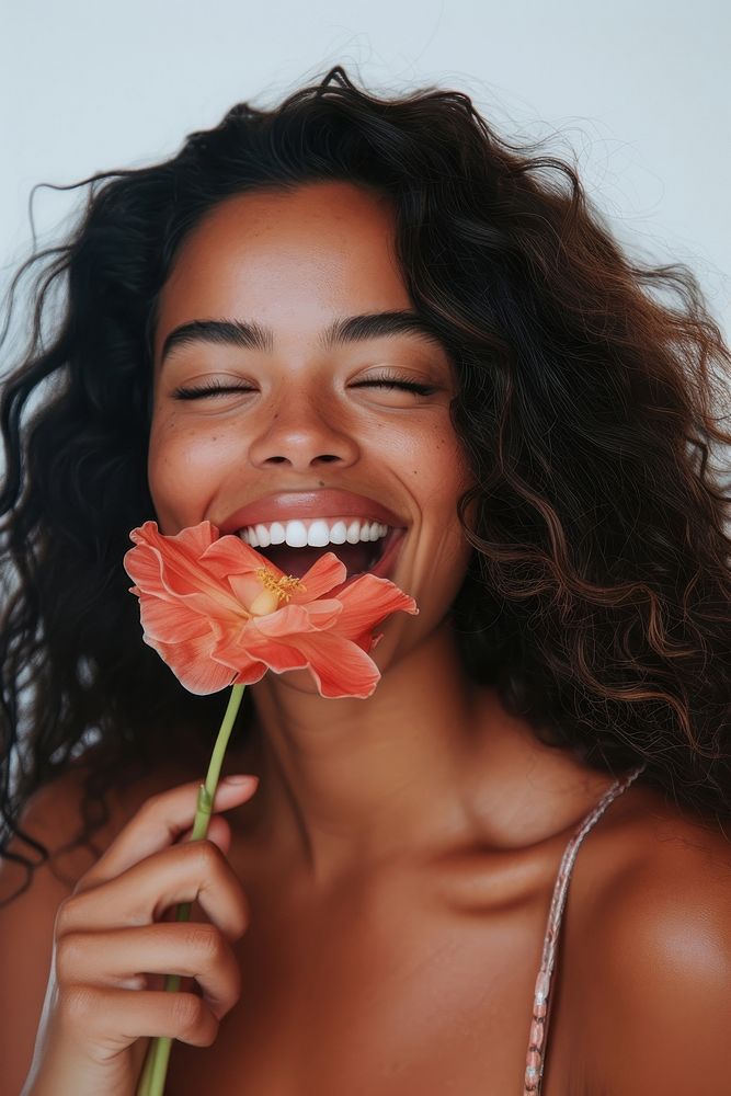 A latina Caribbean woman smile laughing holding.