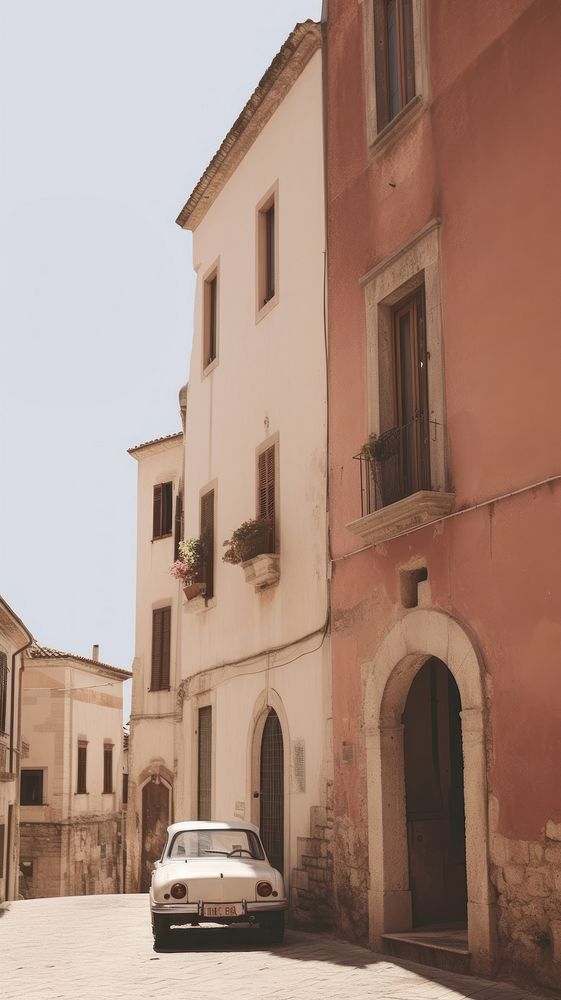 Old italian town architecture building vehicle. AI generated Image by rawpixel.