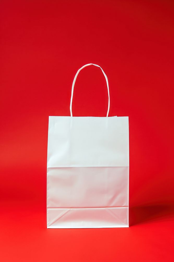 Paper bag packaging  handbag white red.