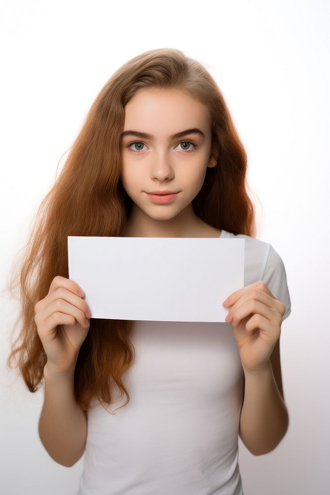 Brave teen girl holding up a white paper sign portrait adult photo.