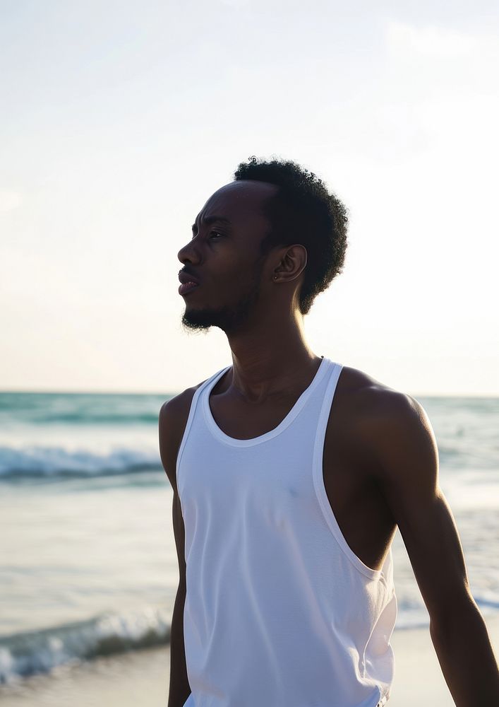 Black man wearing white tank top summer beach adult.