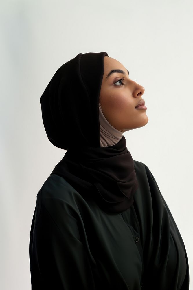 A Muslim woman looks ahead with determination portrait fashion adult.