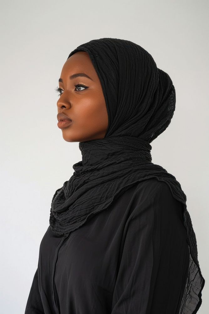 A Muslim woman looks ahead with determination portrait scarf adult.