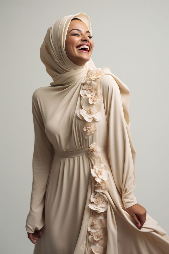 A joyful Muslim woman happiness laughing fashion.