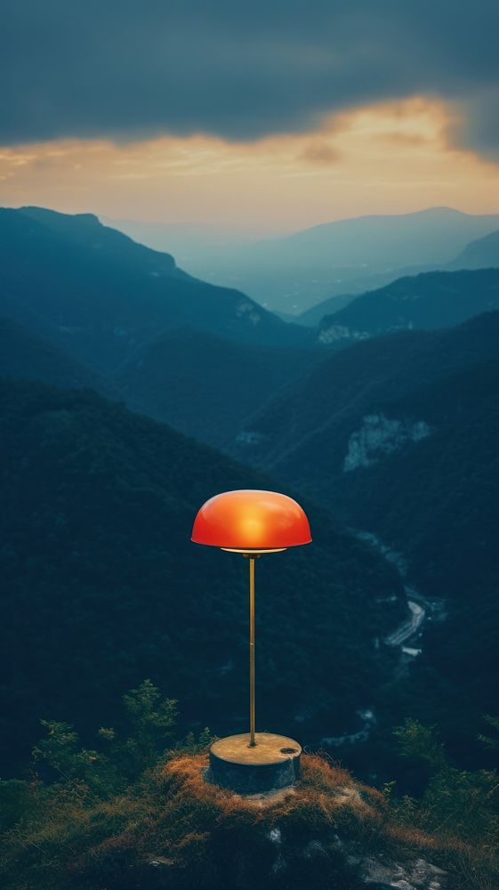 Photography of minimal a cute lamp with hillside landscape outdoors nature sky.