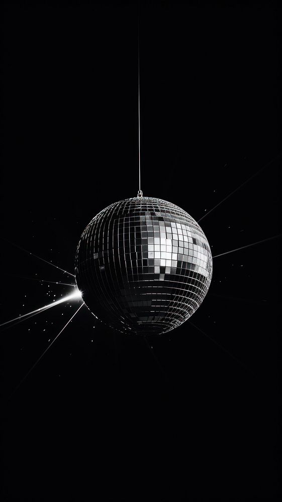 Photography of disco ball sphere black illuminated.