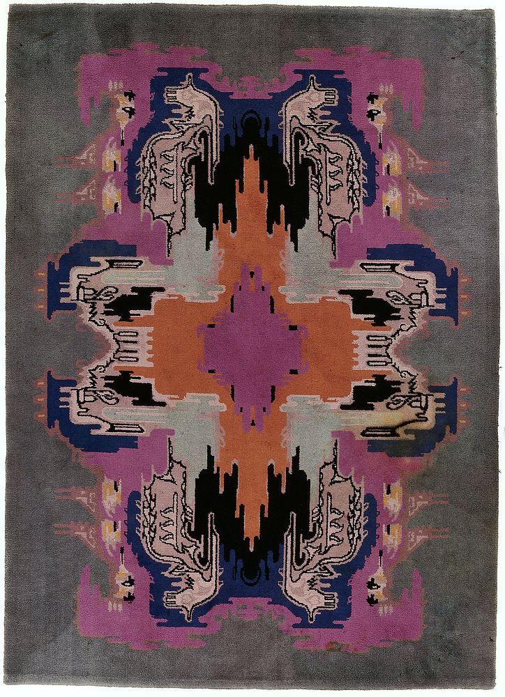 Vloerkleed met een kleurig art déco-patroon binnen een effen grijsgroene rand (c. 1920) by Jaap Gidding and Koninklijke…