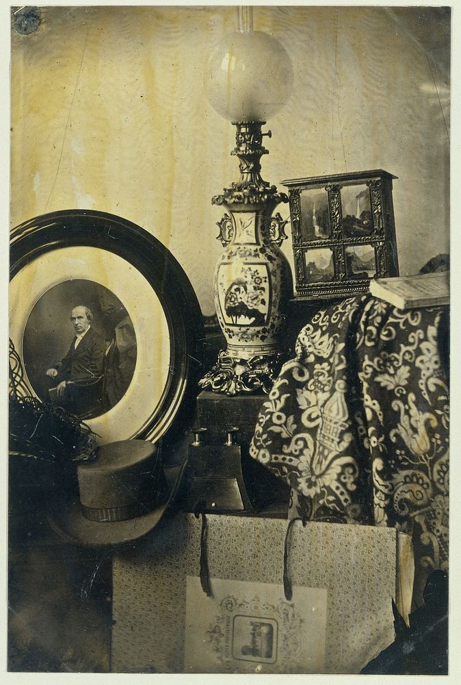 Stilleven met fotografisch portret van Asser, stereoscoop en portfolio (c. 1855) by Eduard Isaac Asser