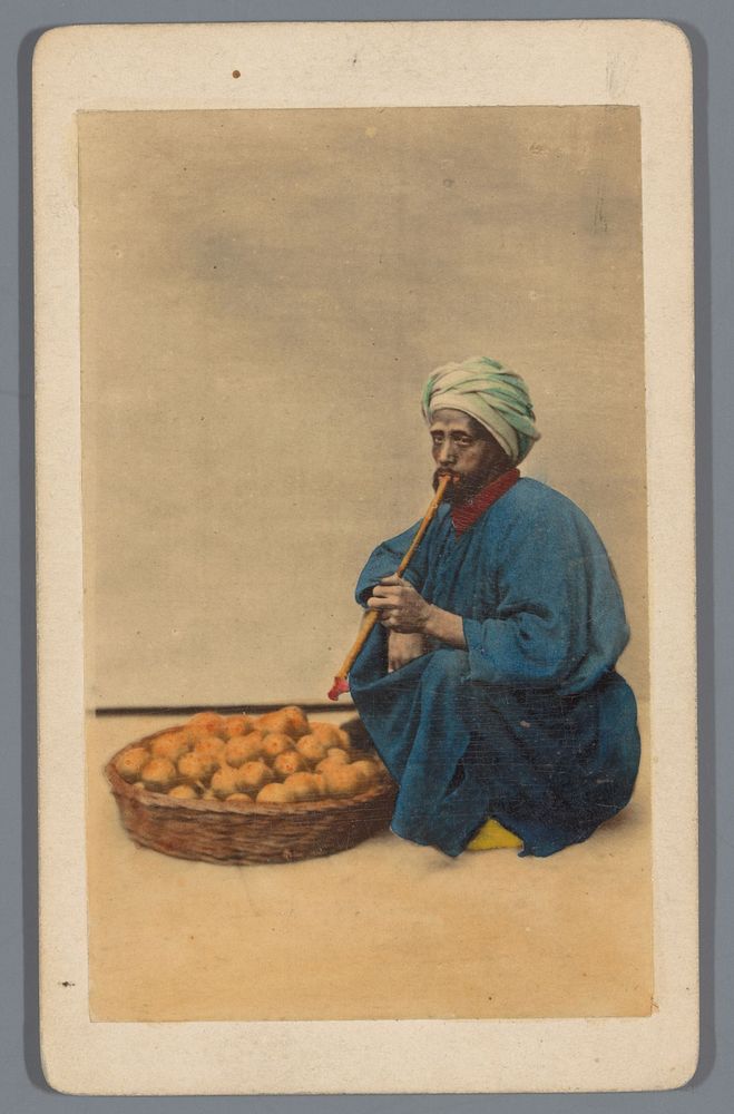 Portret van een onbekende Egyptische man met pijp en sinaasappels (1860 - 1869) by Wilhelm Hammerschmidt