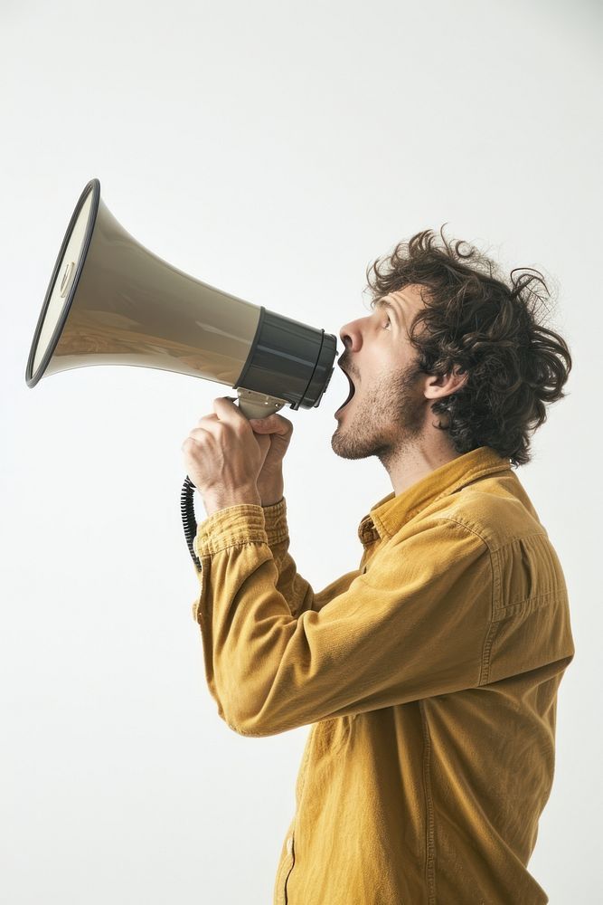 Man speaking through a megaphone shouting adult photo. AI generated Image by rawpixel.