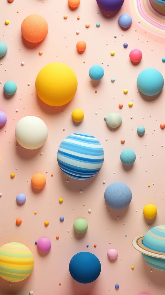  Planets in space pattern backgrounds egg confectionery. AI generated Image by rawpixel.