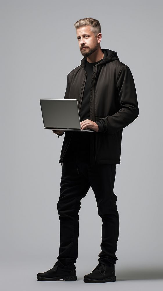 Man standing with laptop photography computer portrait.