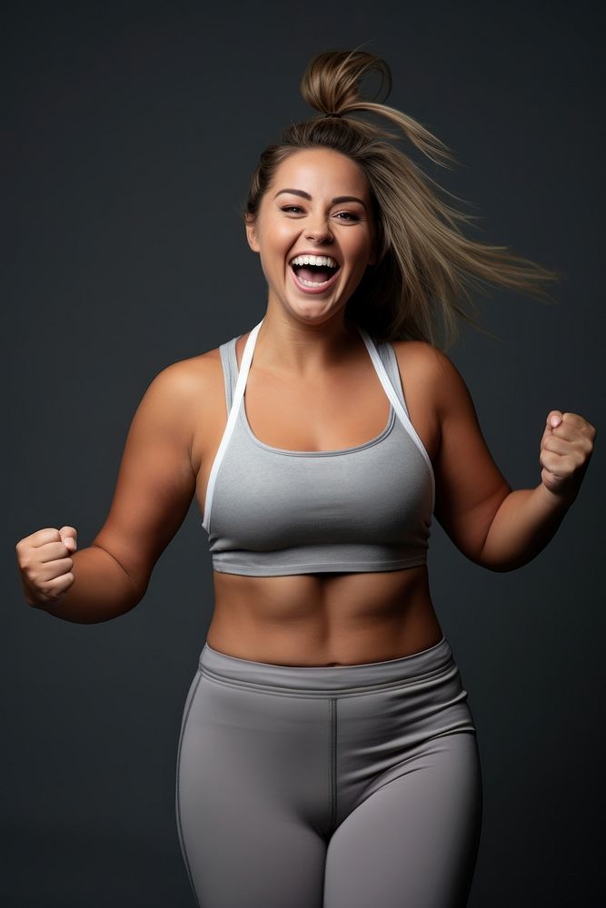 Plus size sport woman in fitness shouting laughing sports.