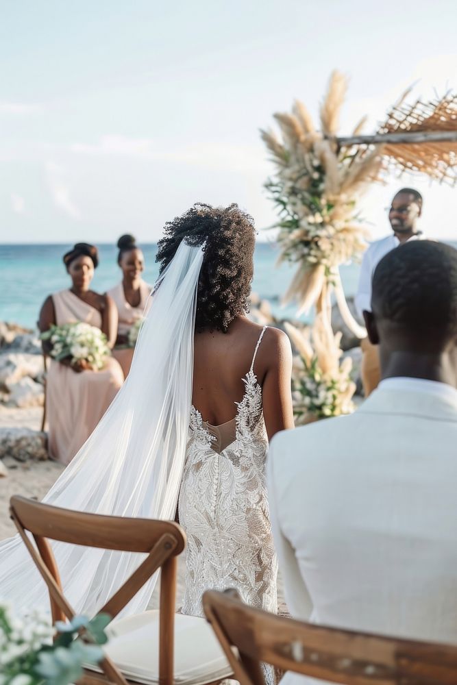 Happy black couple getting married at an island wedding bride adult.