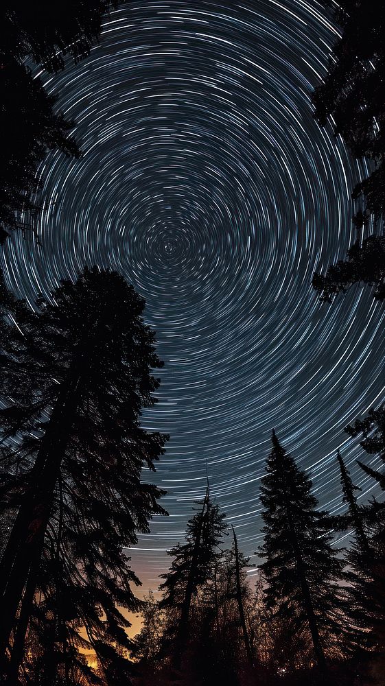  Star trails astronomy outdoors nature. AI generated Image by rawpixel.