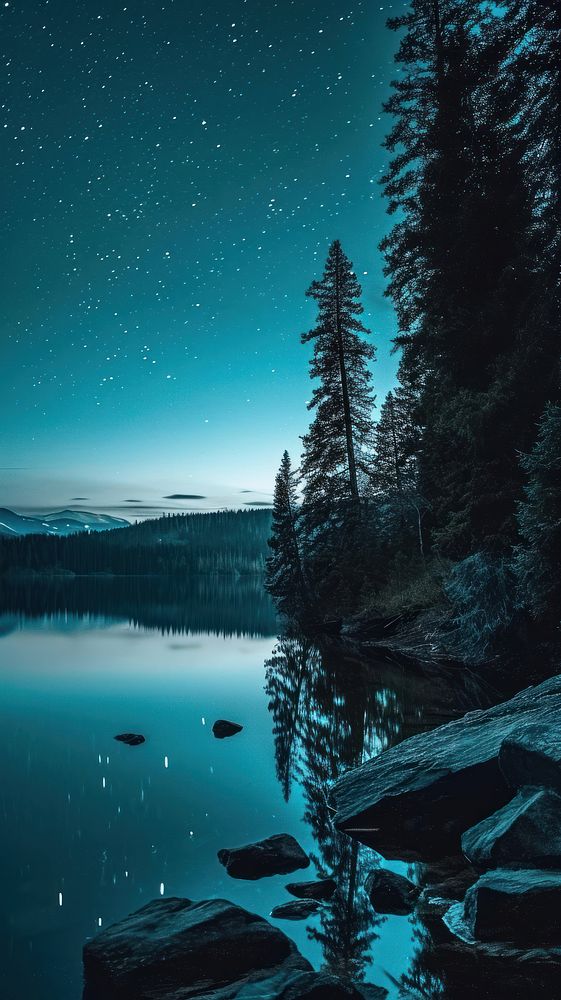  Starry night at lake landscape outdoors nature. AI generated Image by rawpixel.
