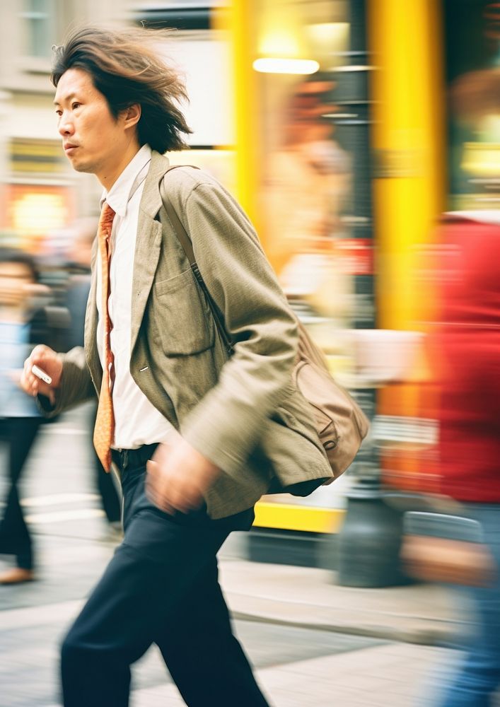 Motion blur man walking on street photography portrait speed.