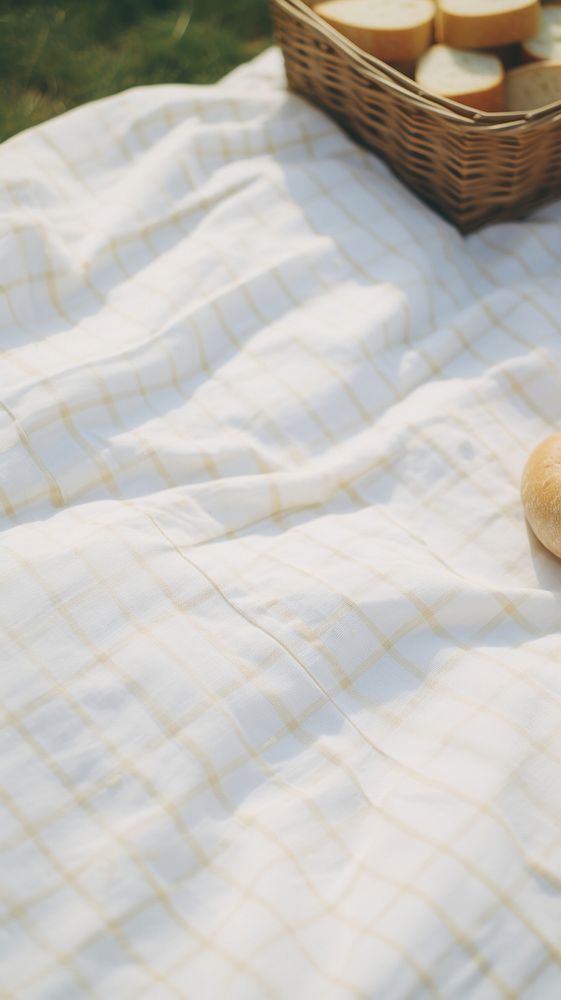 Picnic blanket linen bed. AI generated Image by rawpixel.