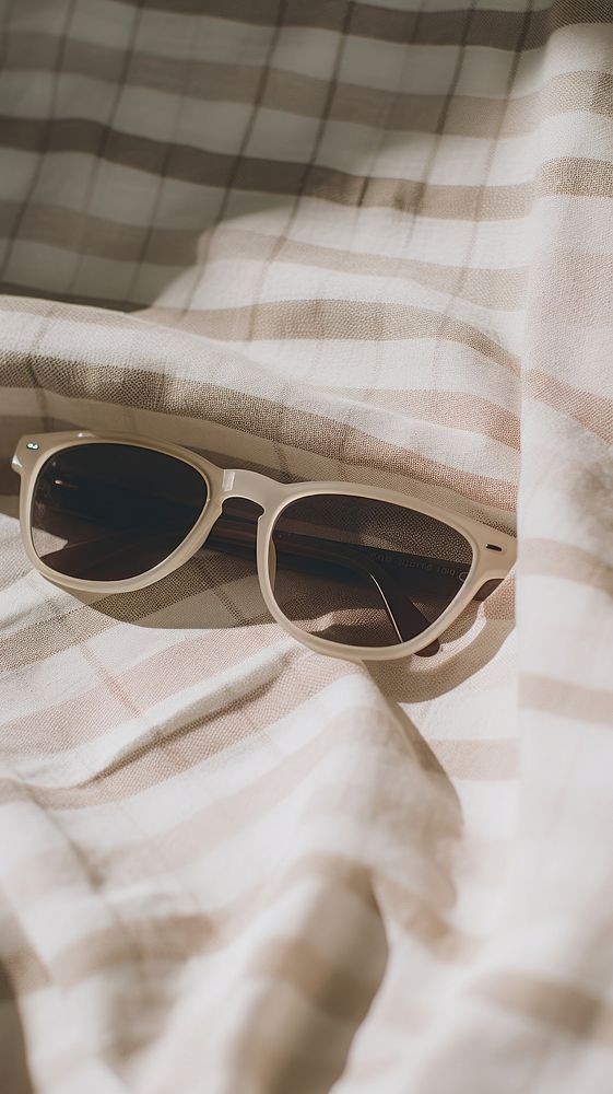 Vintage sunglasses blanket accessories relaxation. AI generated Image by rawpixel.