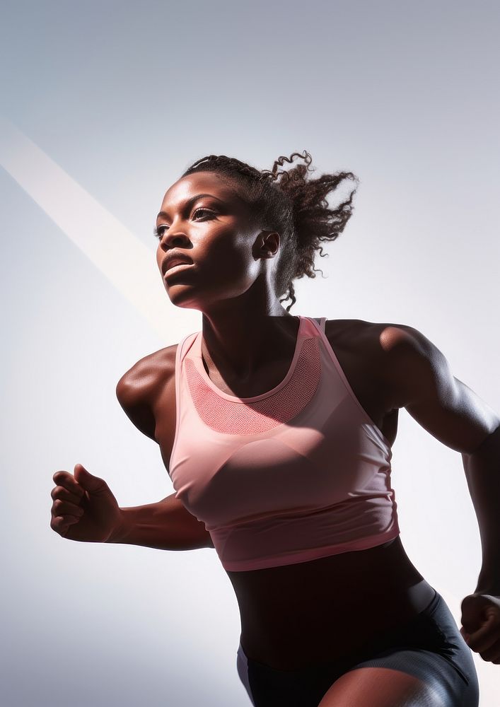 Black female athlete is running jogging adult pink.