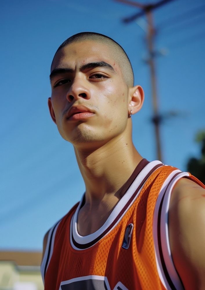 Skinhead Mexican young man basketball men portrait.