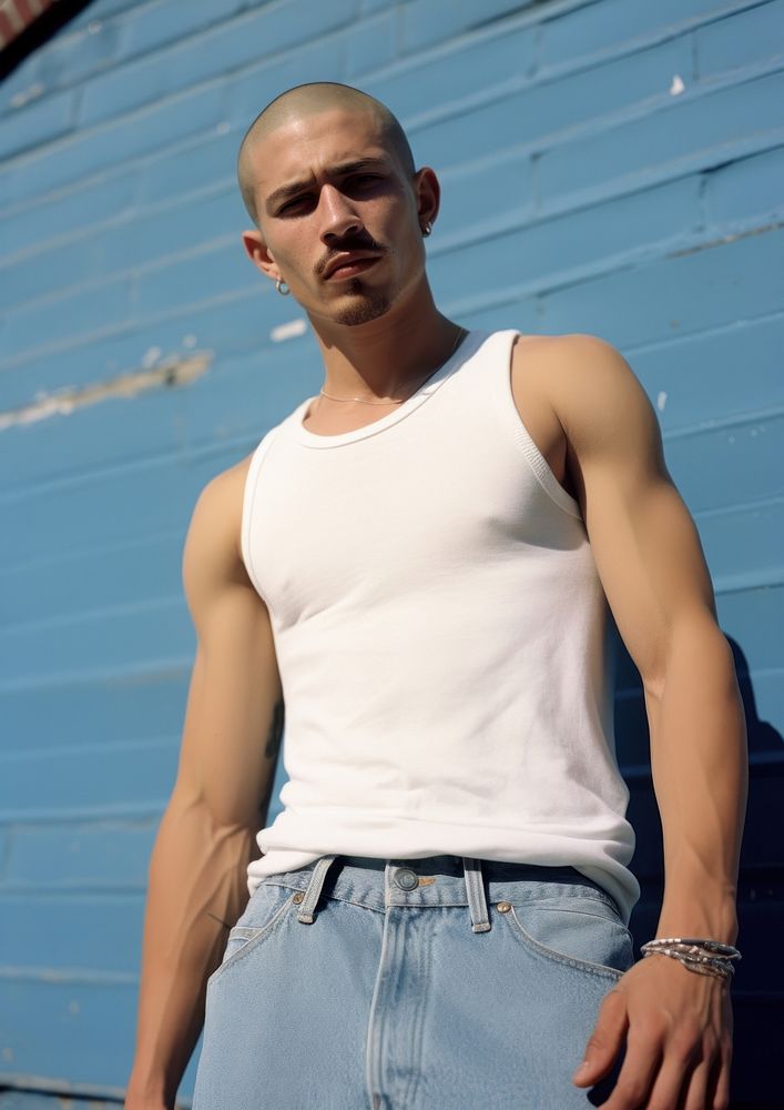 Latin man skinhead with Mustache fashion sports jeans.
