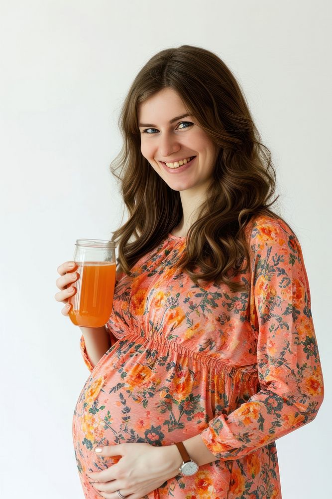 Pregnant british woman portrait drink smiling.