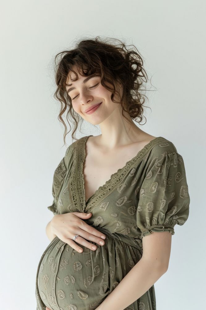 Pregnant british woman portrait smiling dress.