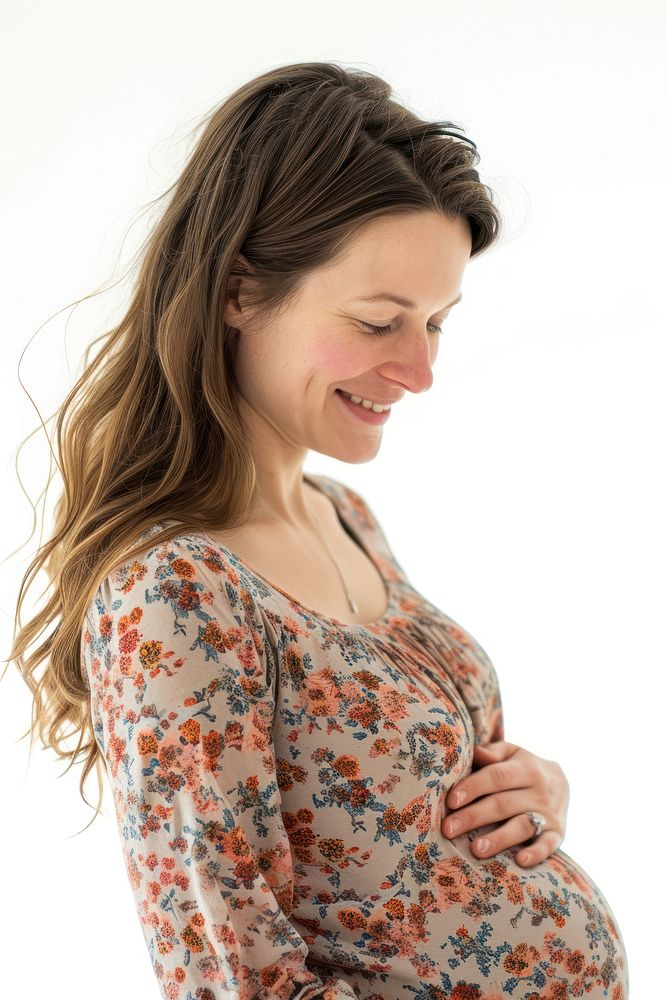 Pregnant british woman portrait smiling looking.