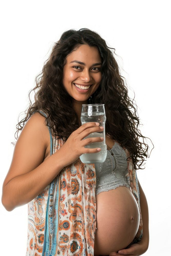 Pregnant latin woman portrait drinking smiling.