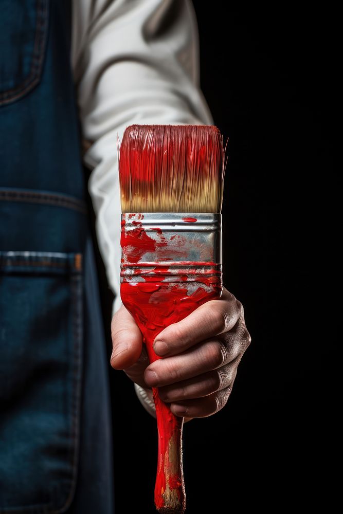 Hand holding paint brush paintbrush standing finger.