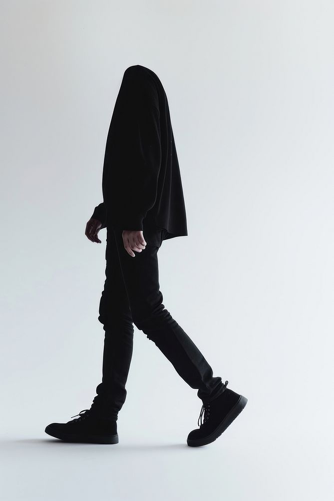 Person walking silhouette footwear standing.