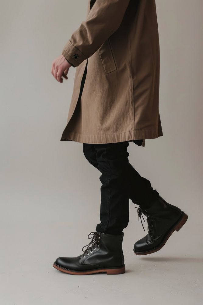 Person walking footwear overcoat adult.