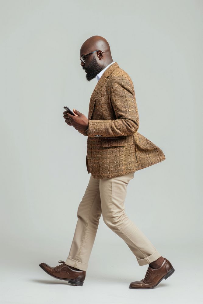 African-american adult man footwear standing phone.