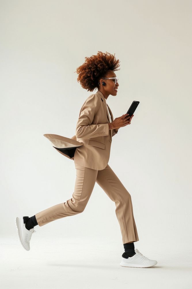 African-american adult woman footwear running phone.