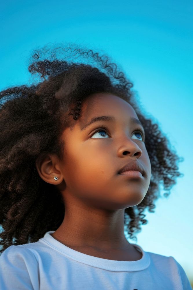 Peaceful african american girl child skin blue.
