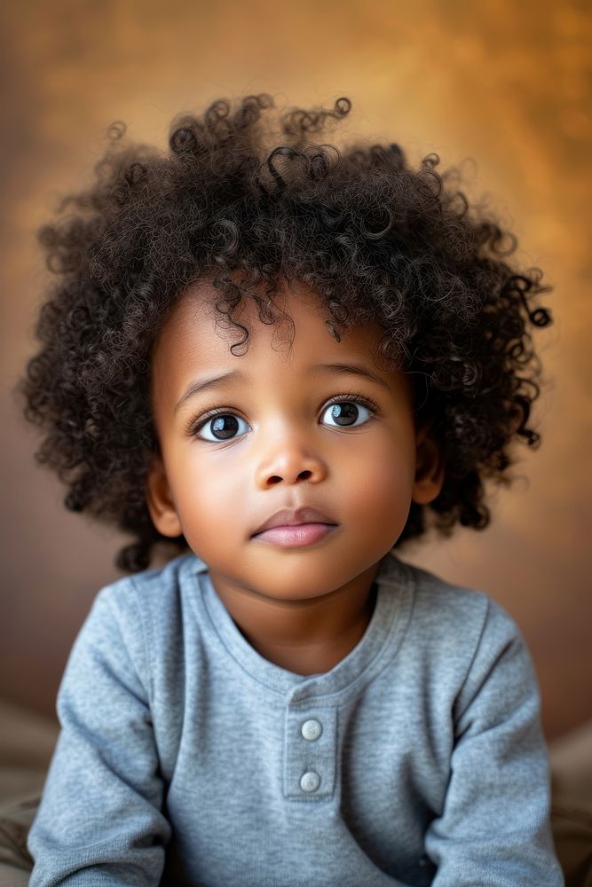 Adorable African American little boy portrait child studio shot.