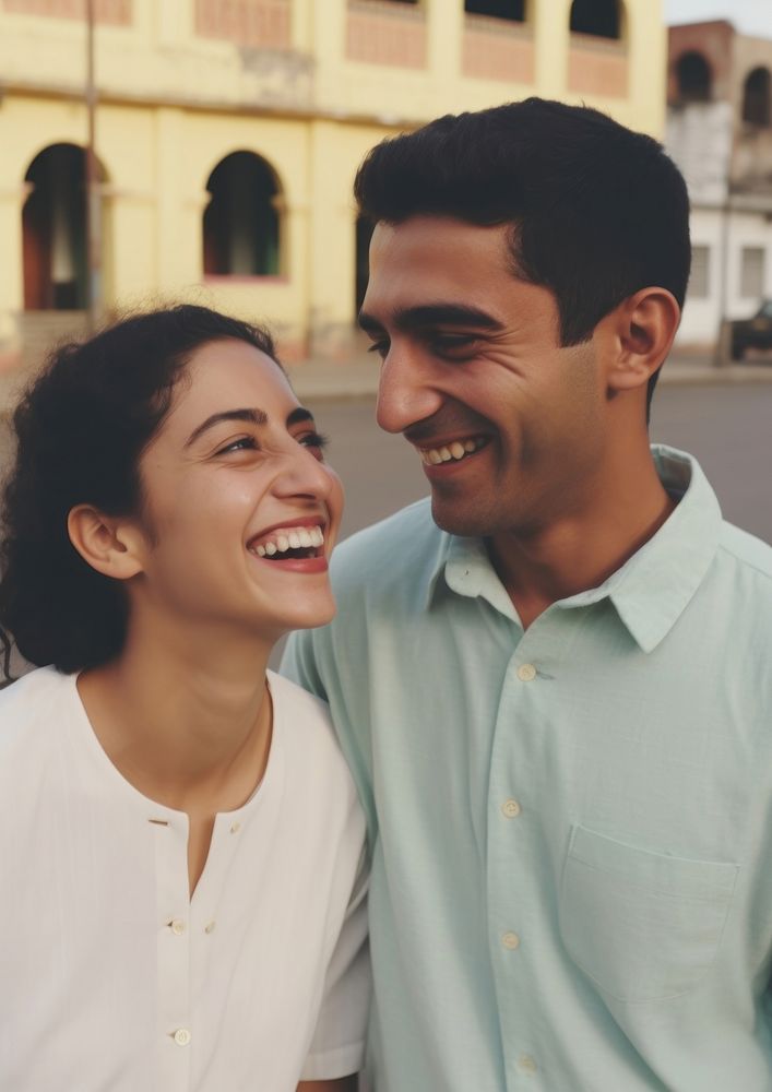 Hispanic cute couple laughing portrait smile.