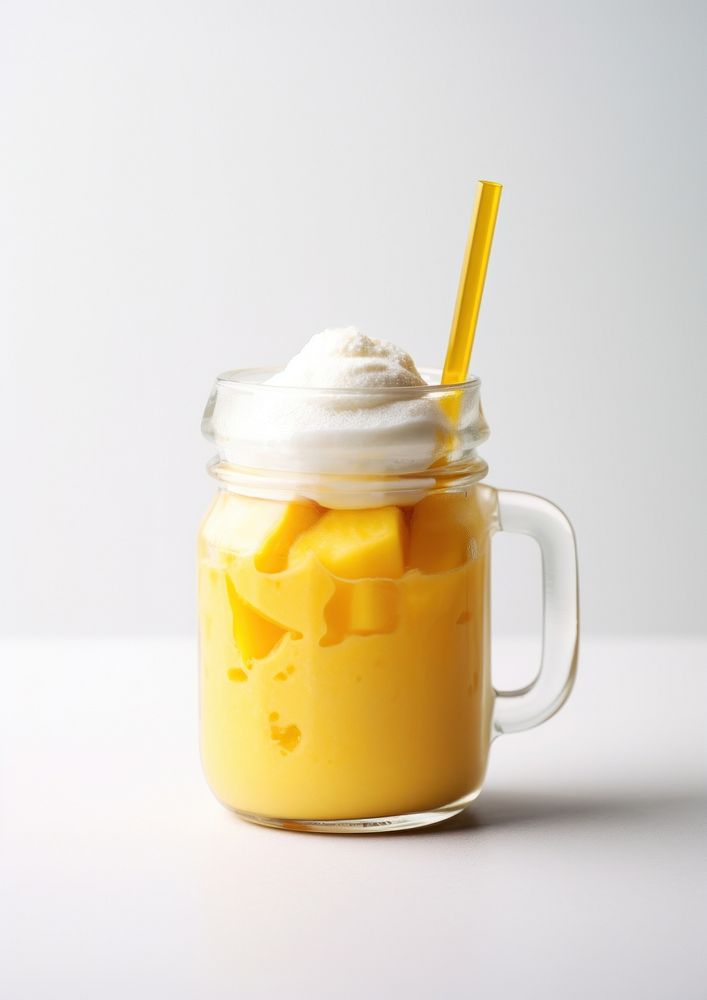 Mango juice frappe in glass mug jar food dessert drink.