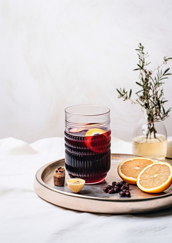 Mulled wine in glassware rock food fruit drink.