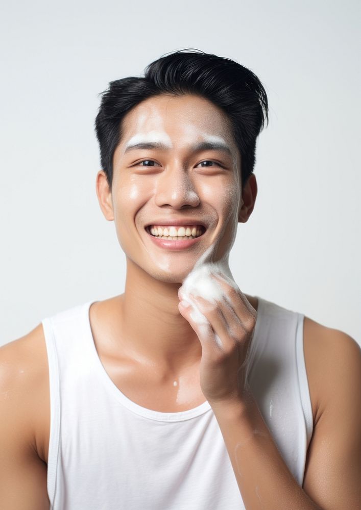 Man cleaning his face smile portrait adult.