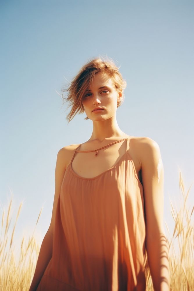 Expired film photography of woman portrait dress fashion summer. AI generated Image by rawpixel.