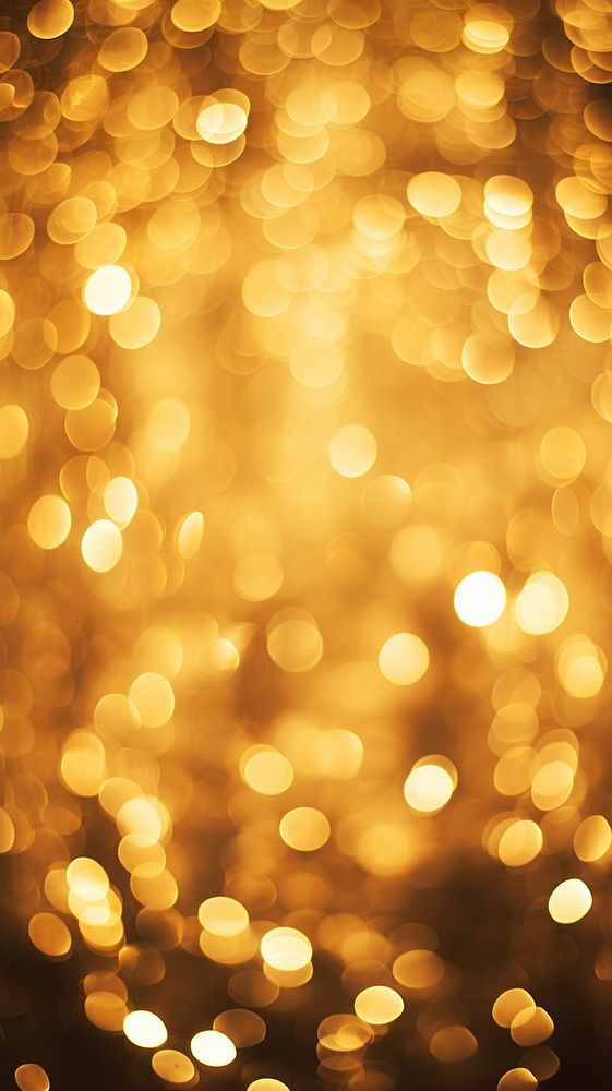  Bokeh light wallpaper gold lighting illuminated. AI generated Image by rawpixel.