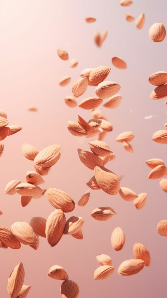  Almonds fallin from the sky like a rain petal seed backgrounds. AI generated Image by rawpixel.