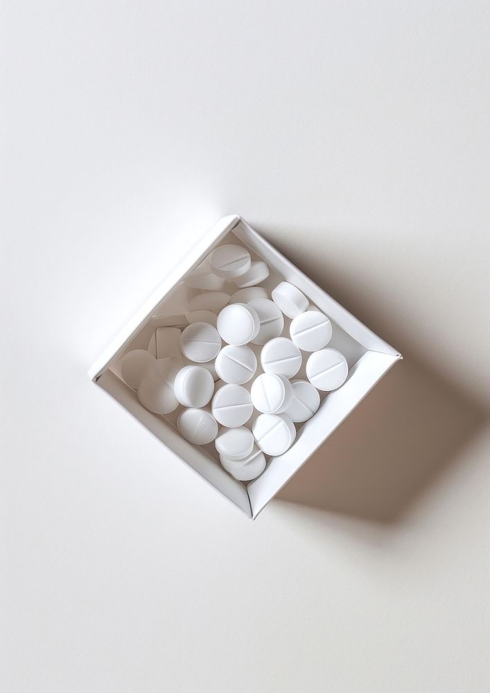 Medicine white pill box.