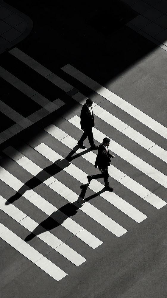 People walking at crossroad monochrome motion light.