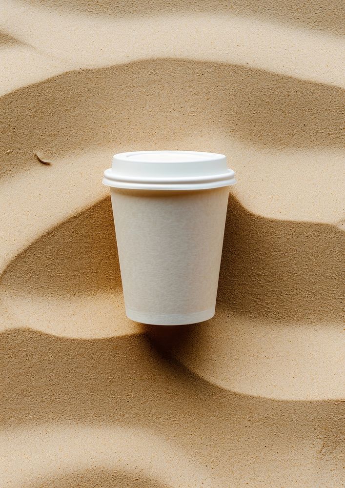 Coffee cup  outdoors sand mug.