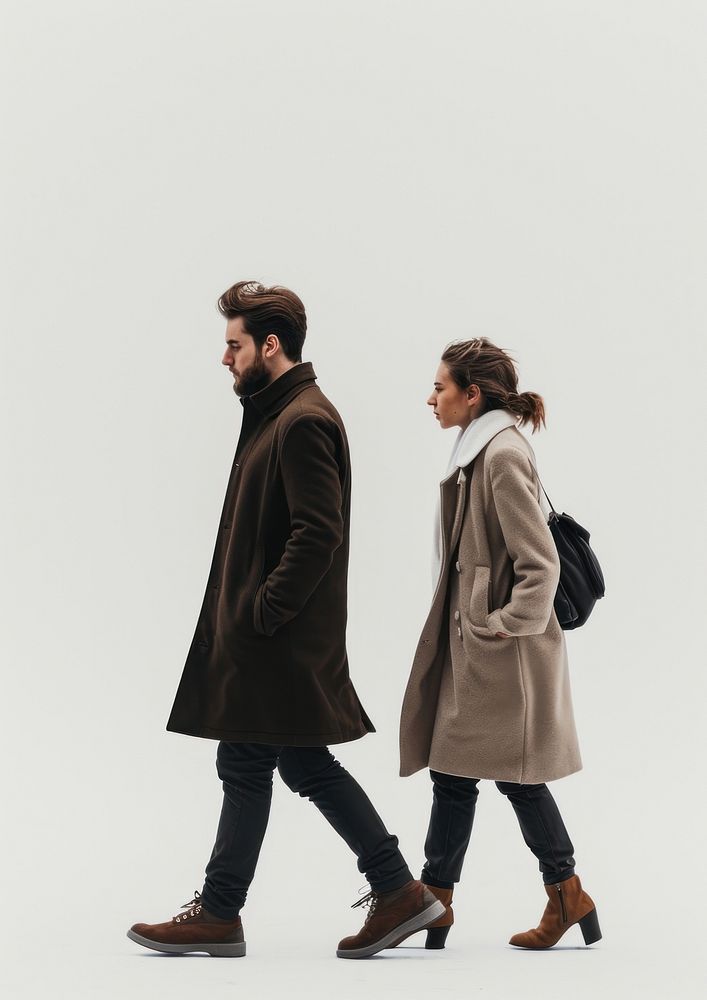 Couple overcoat footwear walking.